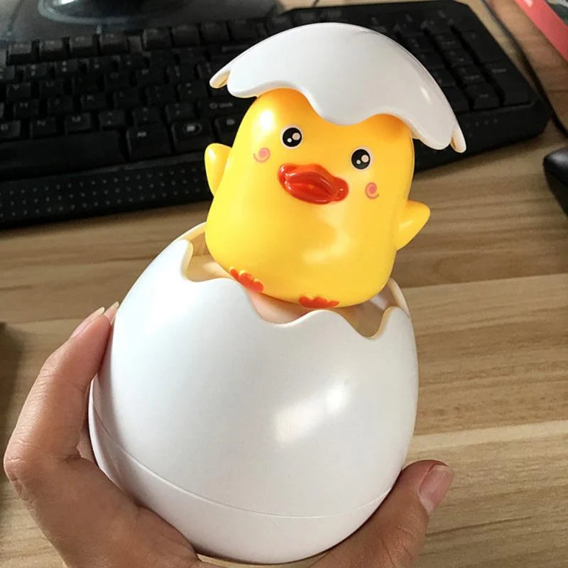 Cute Water Spray Duck Eggs Bath Toy Magic Hatching Growing Duck